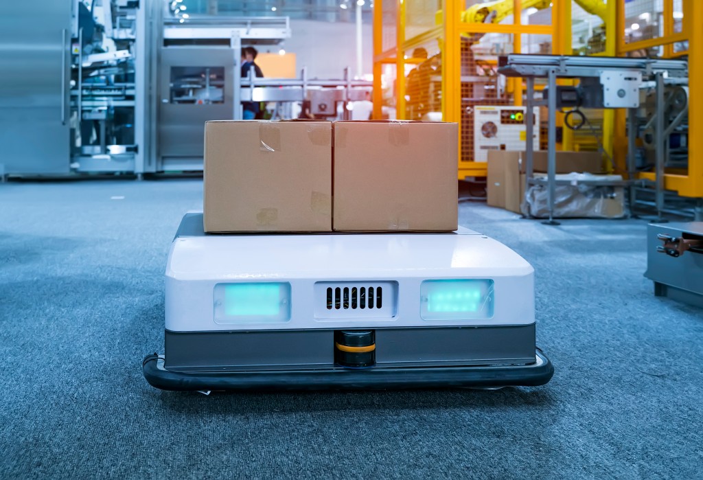 A mobile robot transporting parcels.